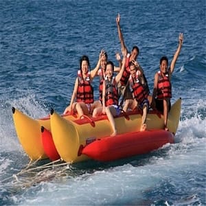 inflatable banana boat playing on the beach surf riding water game water toys summer necessary