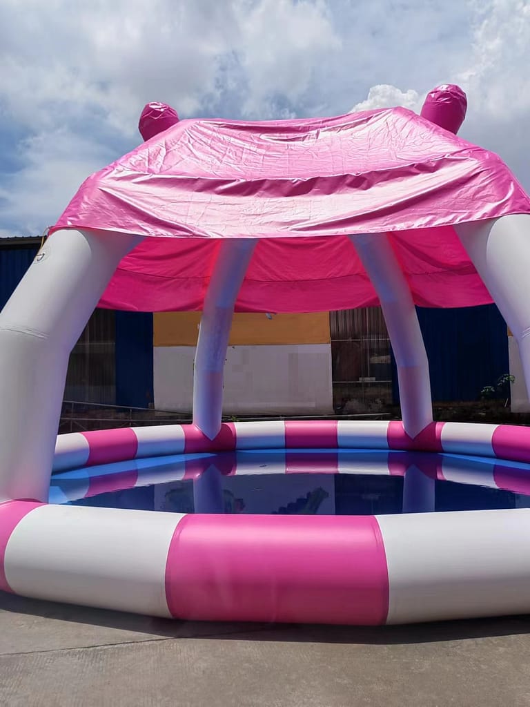 Inflatable mushroom pool with umbrella on top, pink, left side close-up